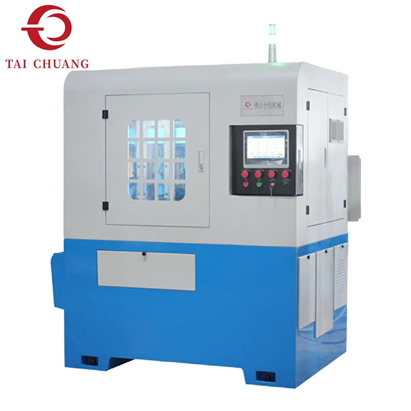 4つのスピンドルがナットタッピングマシンを通過します